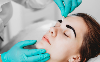 Patient receiving eyebrow tinting